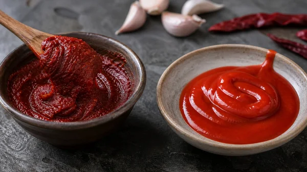 Gochujang vs Sriracha: Paste or Pourable Heat?